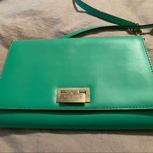 Light green Kate spade purse with good detailing.